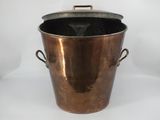 an old copper pot with handles and handles on a white background