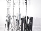 a lot of different types of tripod stands on a white background