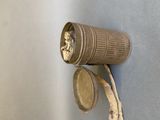 a metal object that is hanging on the wall