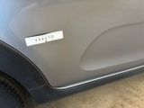 a sticker on the door of a car that says pruto