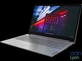 the laptop is open on a black background with the screen turned on