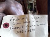 a piece of paper with writing on it sitting on a chair
