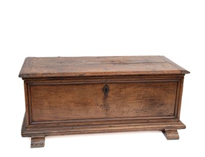 an old wooden chest with a latch on the top
