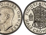 a close up of a coin with a crown on it