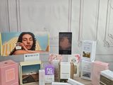 the contents of a beauty box are displayed on a table