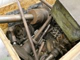 a wooden box filled with various types of gears