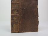 an old book that is sitting on a table