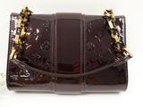 louis vuitton brown patent handbag with gold chain strap
