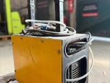 a yellow box that has a bunch of wires in it