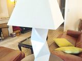 a lamp that is sitting on a table in a living room