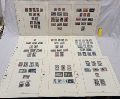 a lot of different stamps on the pages of a book