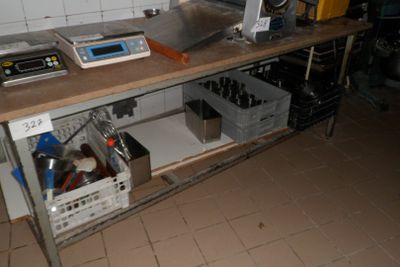 an image of a workbench with a lot of tools on it