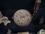 a lot of items that are on a black surface