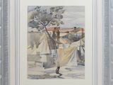 framed watercolor painting of a woman drying clothes on a clothes line