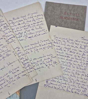 several handwritten letters are on a table next to a piece of paper