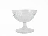 a clear glass bowl on a white background