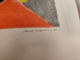 a drawing of an orange, black, and grey triangle