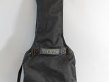 an image of a guitar case sitting on top of a white surface