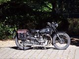 a black motorcycle that is parked on the side of the road