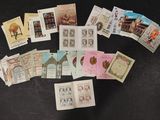 a lot of different stamps on the table