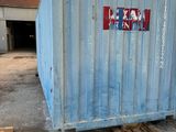 a blue shipping container with a sticker on it