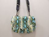 blue and green snakeskin purse with black strap