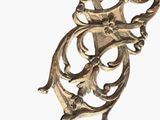 a metal object that is on a white surface