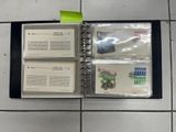 a binder that has a lot of books inside of it