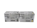 two black and white toner cartridges sitting on top of each other
