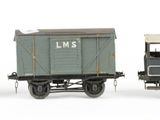 five toy trains that are lined up in a row