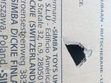 a box with a hole in it that has a sign on it