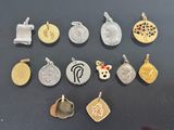 a close up of a bunch of charms on a table