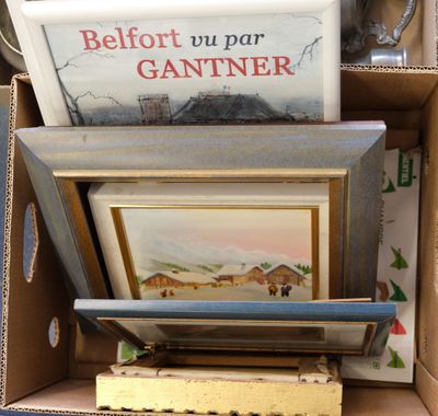 a box full of books and pictures in it