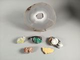 a lot of different rocks and stones on the table