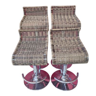 pair of wicker bar stools with chrome bases