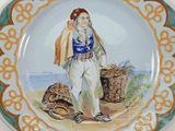 a plate with a picture of a woman on it