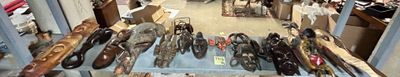 many pairs of shoes that are on display in a store