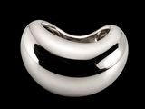 silver plated ring on a black background with a black background