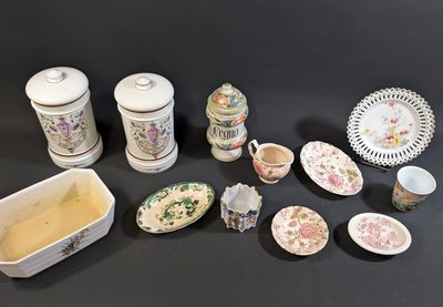 many different types of dishes and bowls on the table