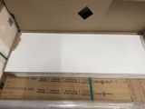 a box with a sheet of paper on top of it