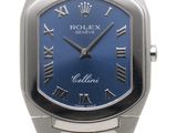 an image of a close up of a wrist watch with roman numerals