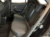 the back seats of a car are empty and the passenger seat is empty