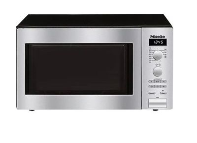 une image d'un four à micro-ondes sur fond blanc