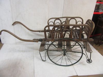a small wooden cart that is sitting on a table