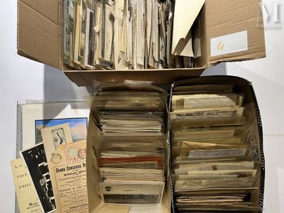a cardboard box full of old records on a table