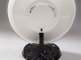 an image of a lamp that is on a table