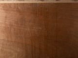 a picture of a piece of wood with a hole in it