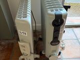two radiators sitting on the floor next to each other