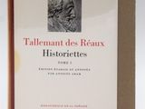 a close up of a book with a picture of a man on it
