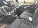 a view of the inside of a vehicle with a steering wheel and dashboard